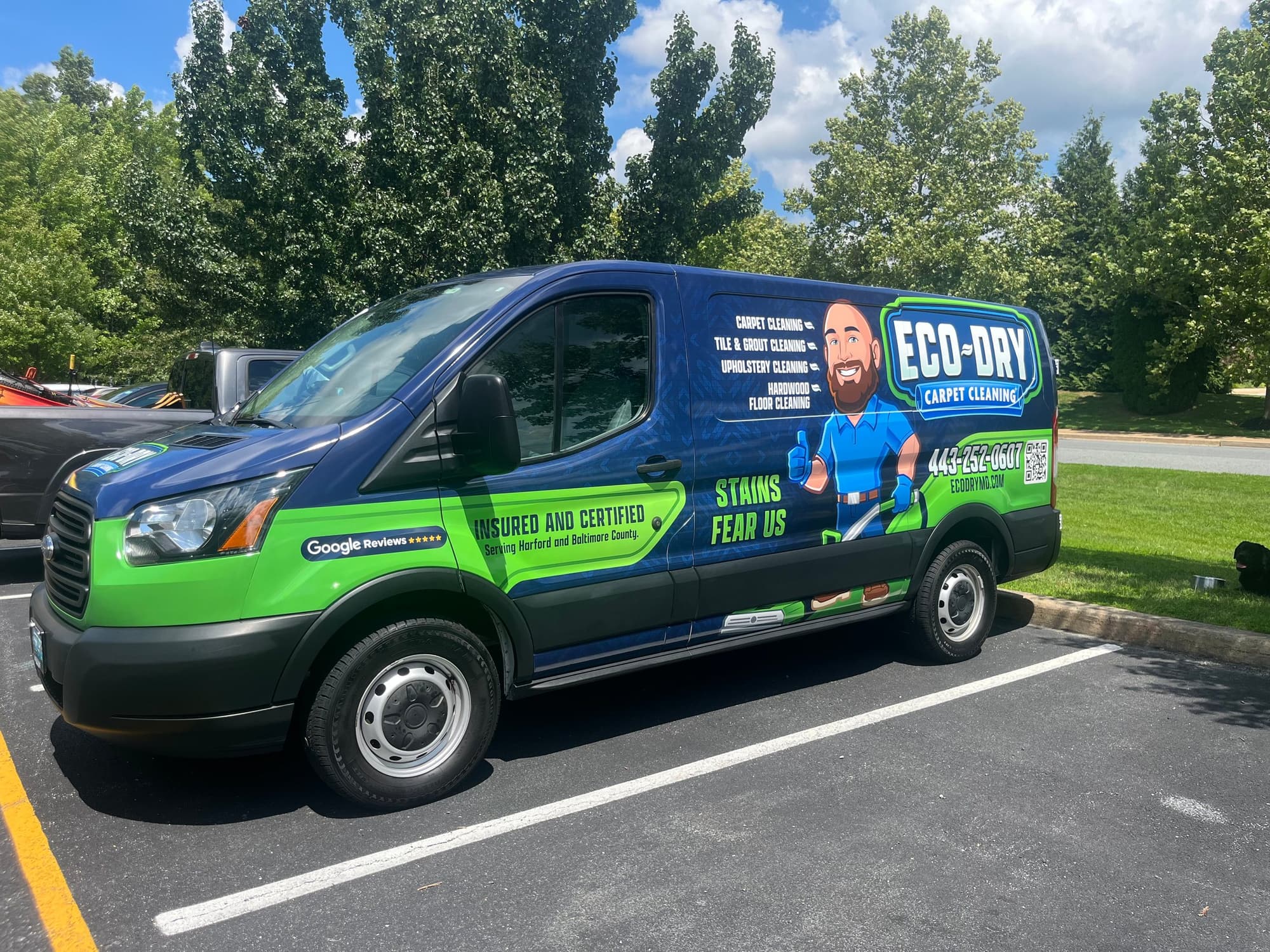 Eco-Dry new blue and green wrapped carpet cleaning van