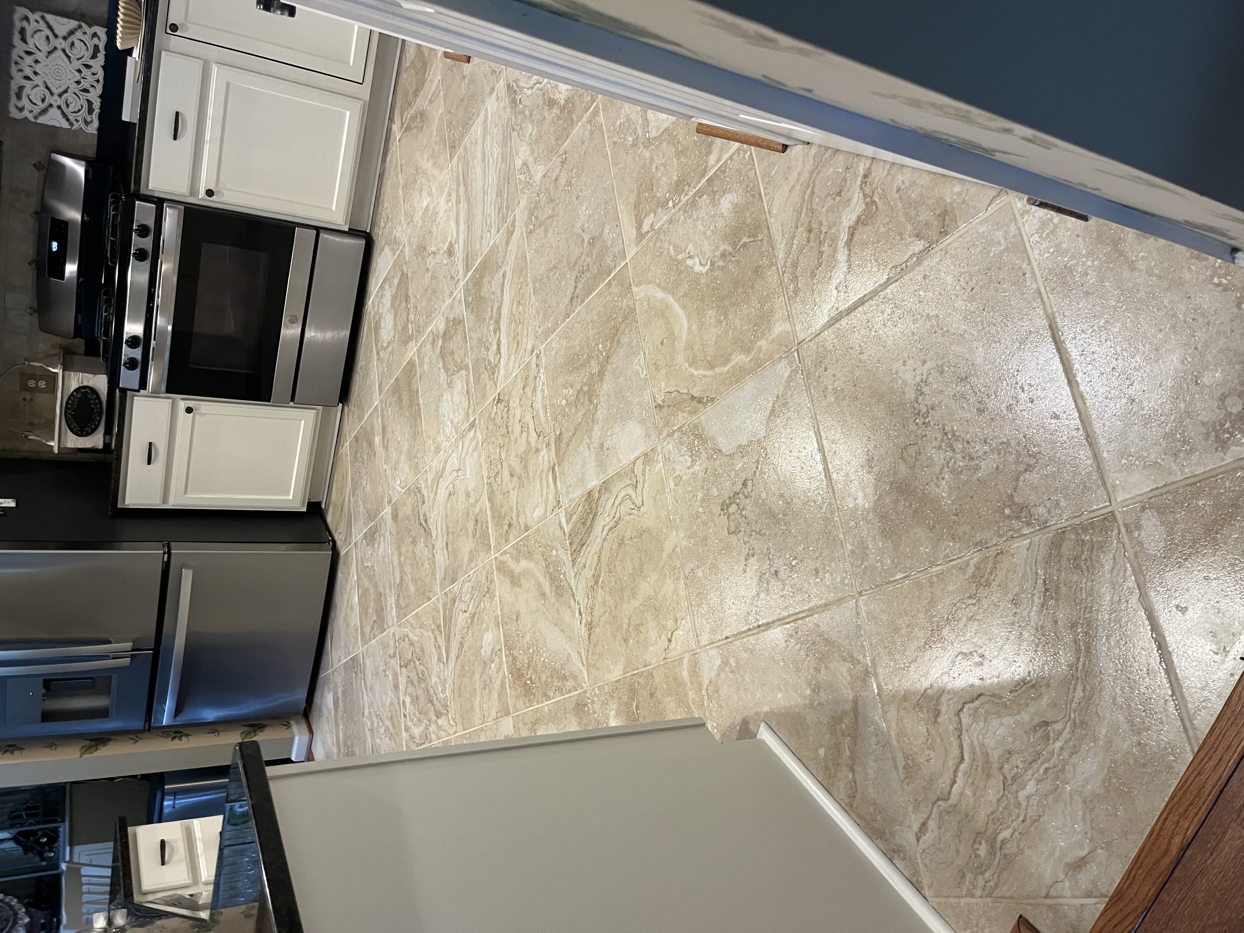 Tile and grout across a kitchen floor