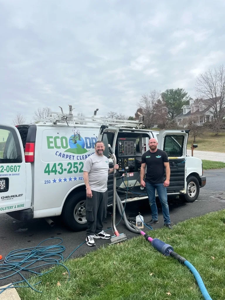 Eco-Dry team with branded van and truck mounted cleaning equipment